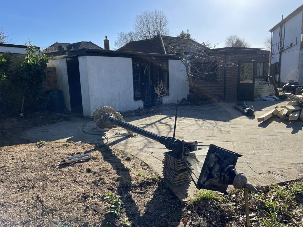 Remnants of previous patio and lighting
